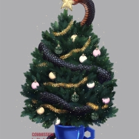 Snake coiled around a decorated Christmas tree